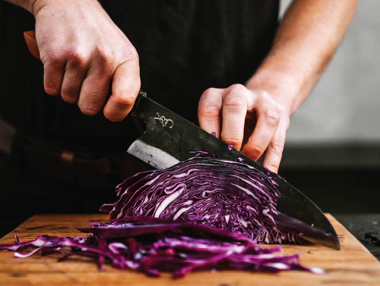 Why Carbon Steel Makes The Best Kitchen Knife